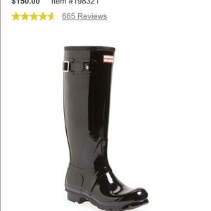 Tall glossy black hunter boots