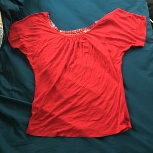red sequined shirt