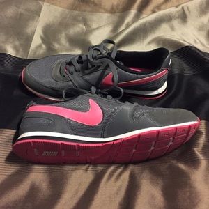 Grey & Pink Nike shoes.