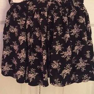 Black floral mini skirt