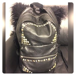 Leather book bag with studs