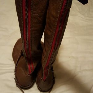Breckell's brown leather riding boots, tall.