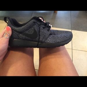 Nike roshe black and dark grey.