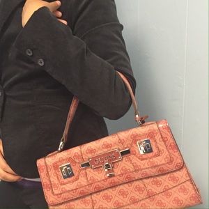 A Guess pink and red bag