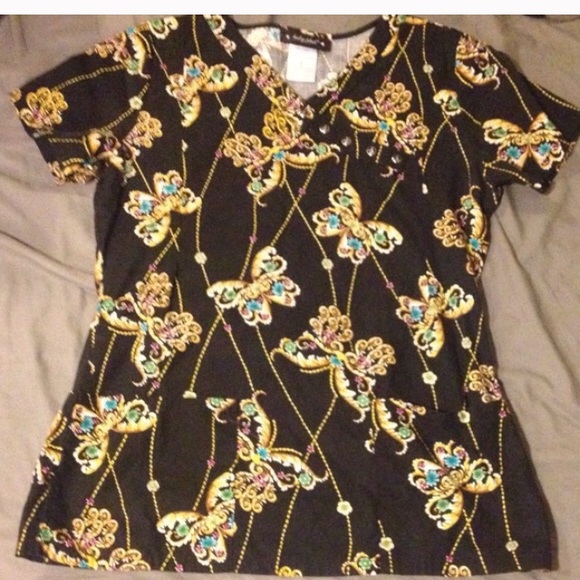 Bundle of two scrub tops.