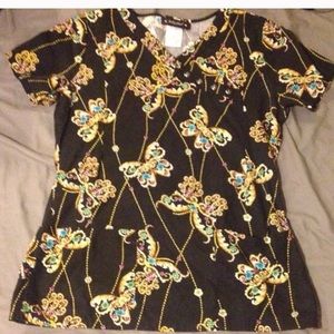 Bundle of two scrub tops.