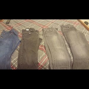 Four pairs of male jeans