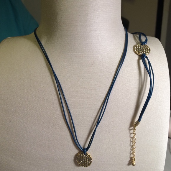 Gold circle blue leather necklace