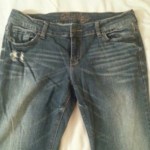 Distressed flare jeans