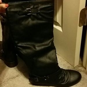 New tall black boots with zipper up the back.