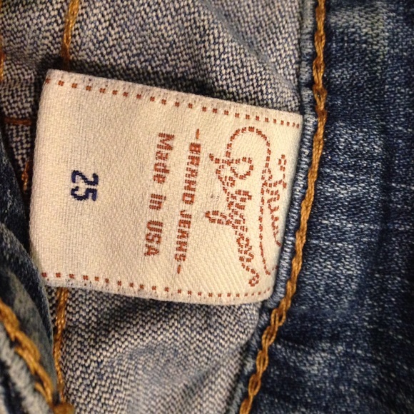 SIZE 25 CUT OFF TRUE RELIGION SHORTS
