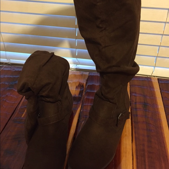 Brown knee boots. Worn once. Pet/Smoke free home