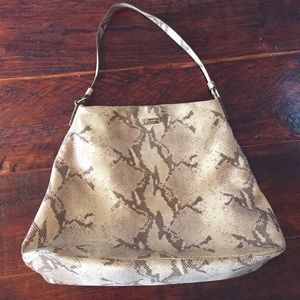 Snake skin Kate Spade bag w purple lining