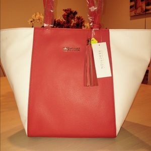 Kenneth Cole Totes.  Must have!
