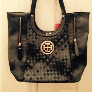 T Symbol Boutique Hand Bags. Two to choose from