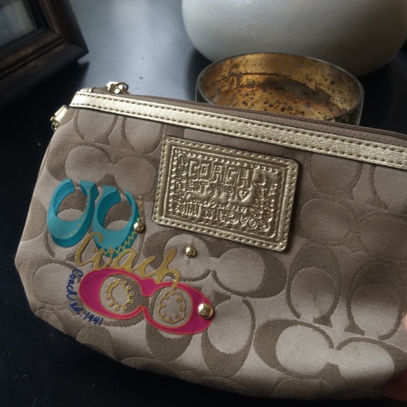 Gold coach wristlet!