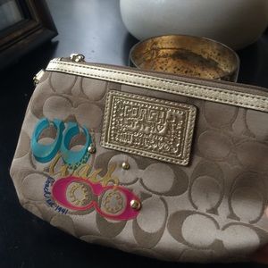 Gold coach wristlet!