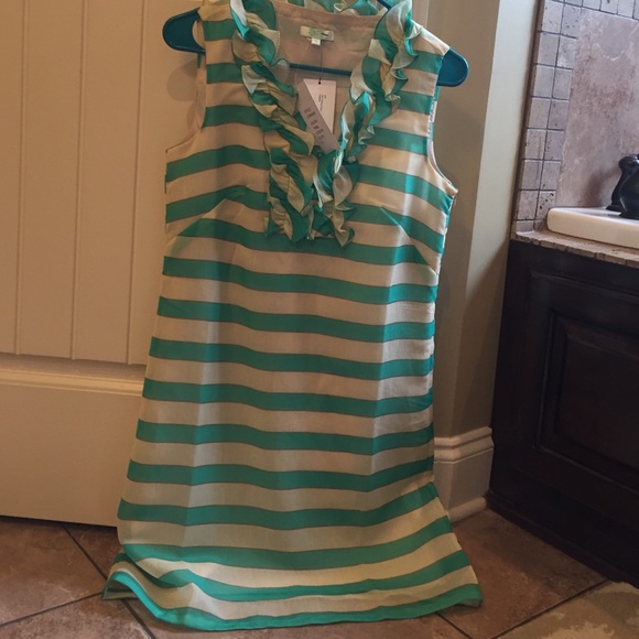 Emerald and tan ruffle dress