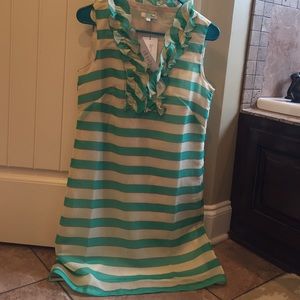 Emerald and tan ruffle dress