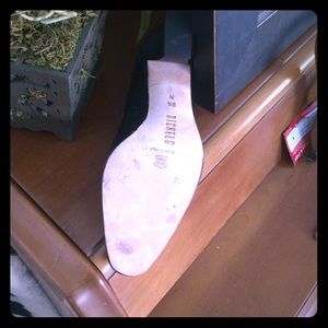 nickels black leather heels. feels more like a 9