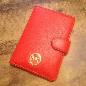 Michael Kors passport wallet