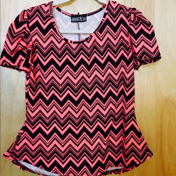 Pink and black peplum blouse