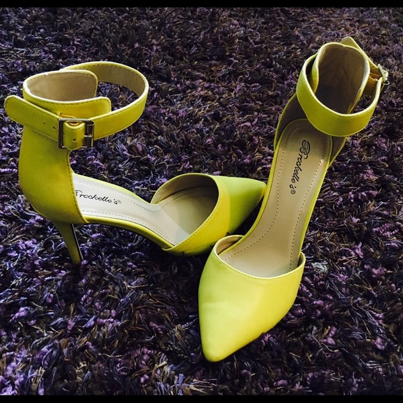 Bright yellow pumps (heels)