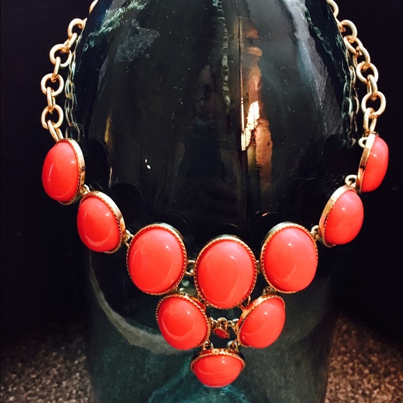 Bright pink and gold statement necklace