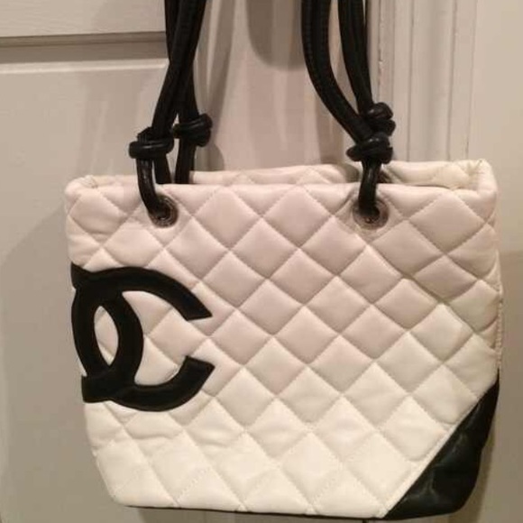 White purse Chanel logo