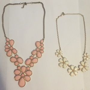 One pink and one white statement necklace!