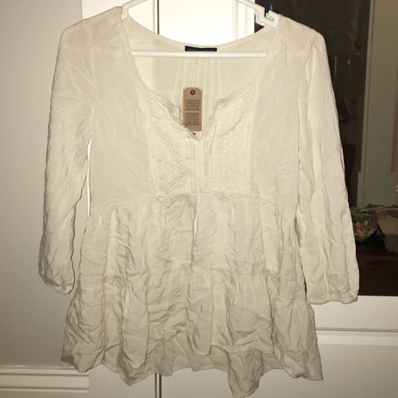 Urban Outfitters Tops - American Eagle white tiered blouse NEED GONE