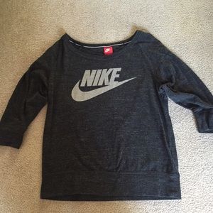 Charcoal gray Nike tee.