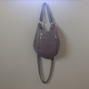 Leather hobo bag with gold accents