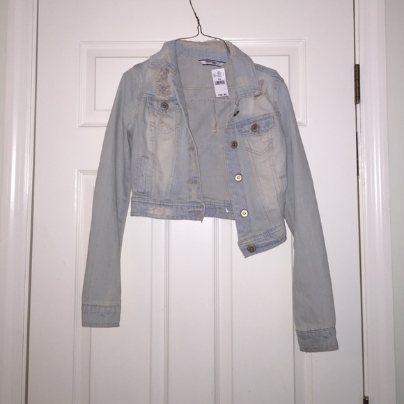 Light wash distressed jean jacket