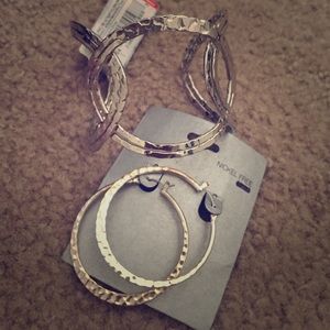 Earrings and arm cuff