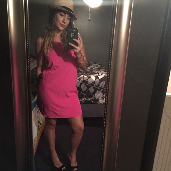 Pink bow back dress.