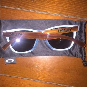 Brown and turquoise frog skin Oakley sunglasses