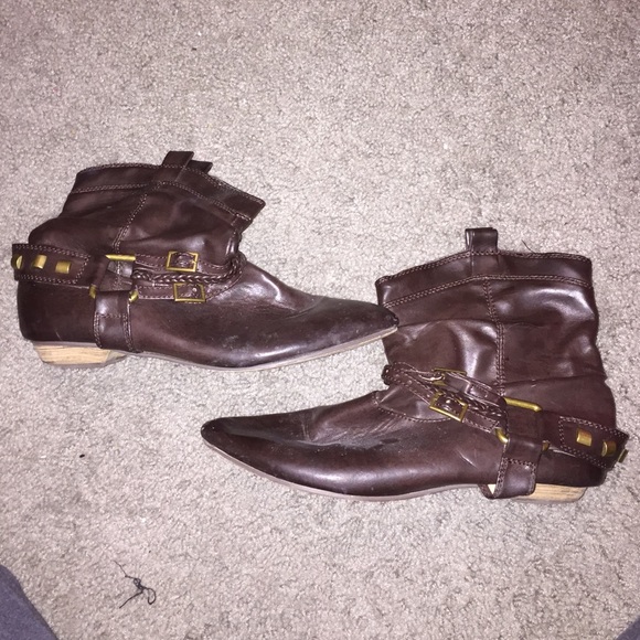 Brown leather ankle booties with gold studs