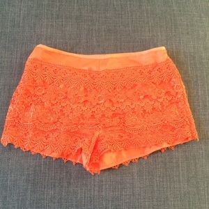Orange lace shorts