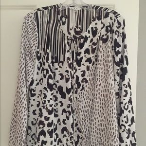 Animal print blouse.