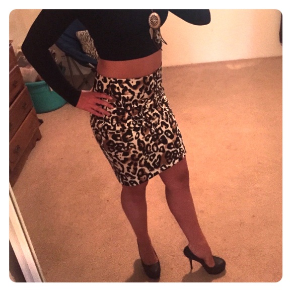 Leopard/ cheetah print skirt and black pumps!