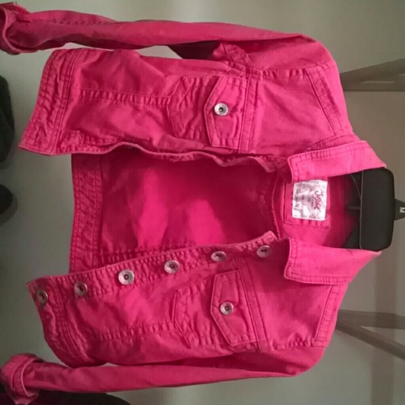 Pink jean jacket.