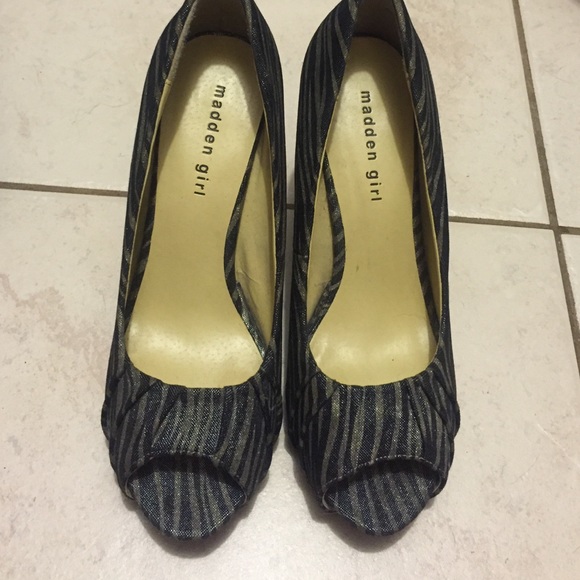 Madden girl peep toe pumps w/ zebra design.