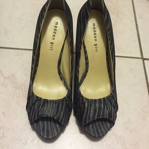 Madden girl peep toe pumps w/ zebra design.