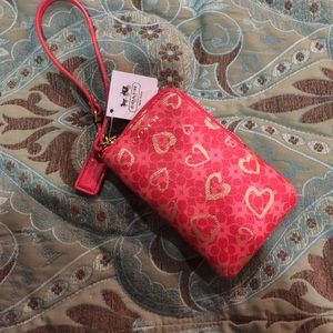 Coach wallet, love red! Never been used.