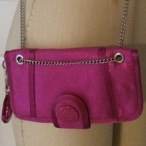 Great pink party bag with silver chain strap.