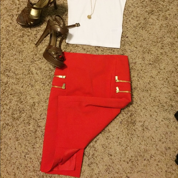 Cute red pencil skirt.  Has a back slit.  NWOT