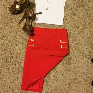 Cute red pencil skirt.  Has a back slit.  NWOT