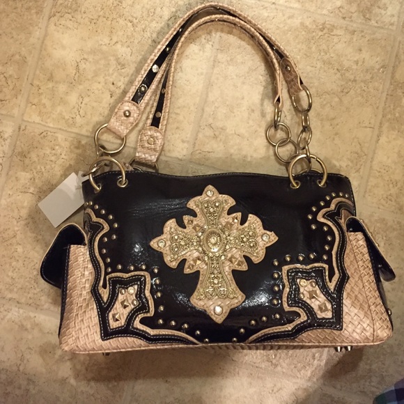 black purse with jeweled cross