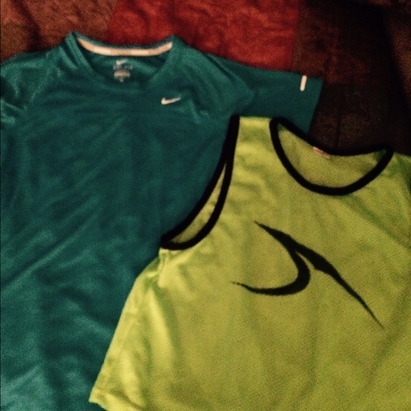 One Nike and One Youth Score sport tops